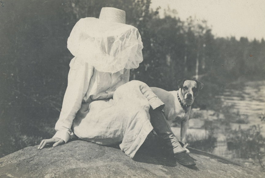 historic photo of early 20th century woman in headnet